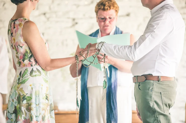 A husband and wife to be at the alter